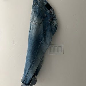 R13 drop crotch cuffed asymmetrical button jeans